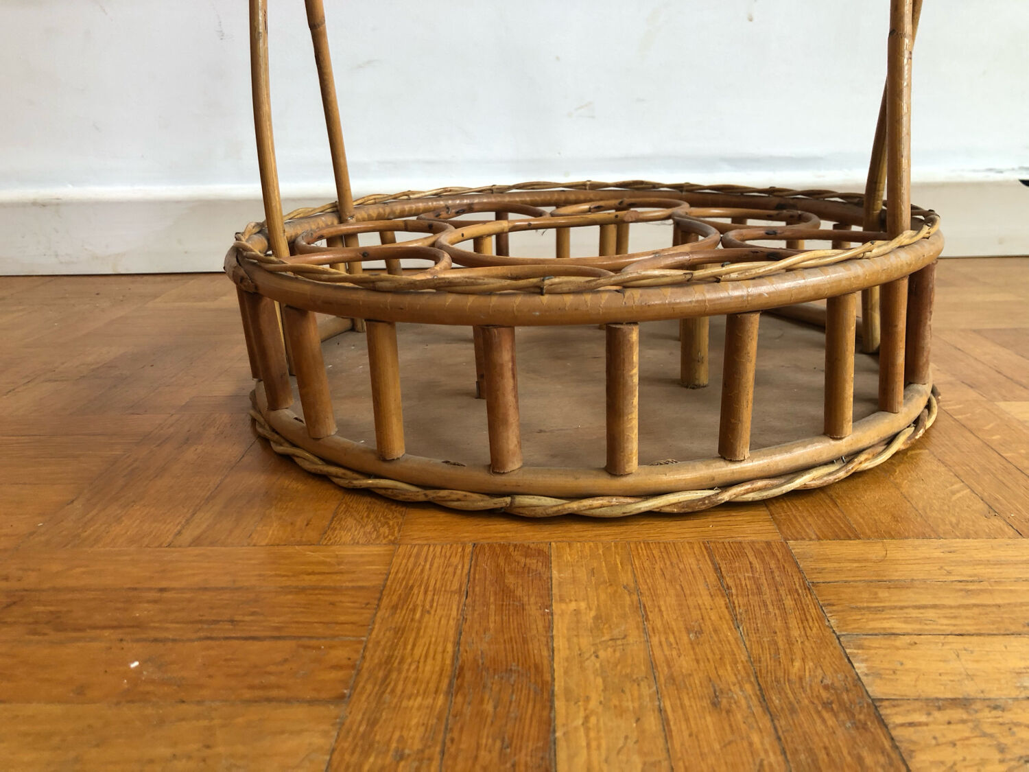 Vintage wicker bottle rack