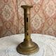Patinated gilt brass candlestick