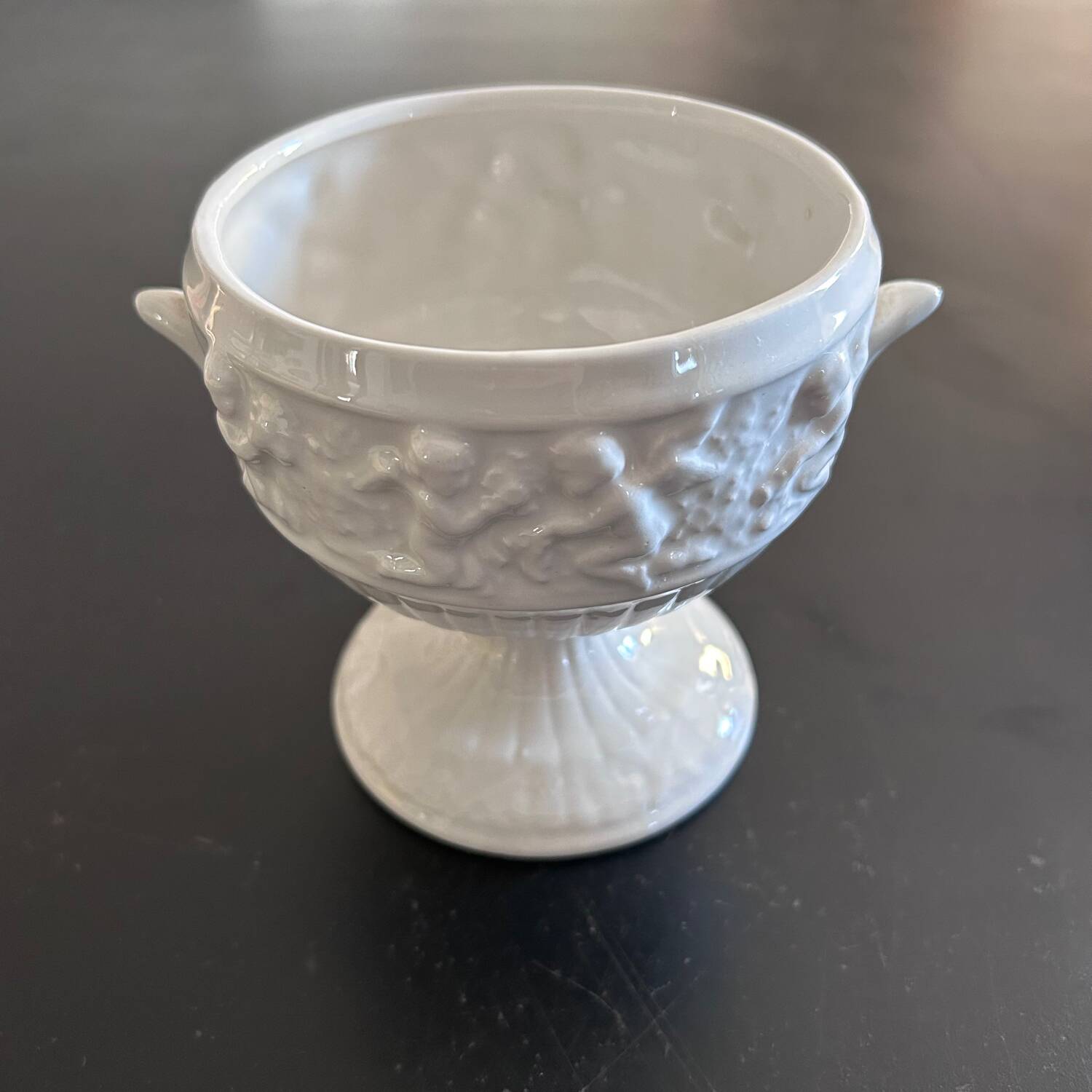 Medici-style vase decorated with cherubs