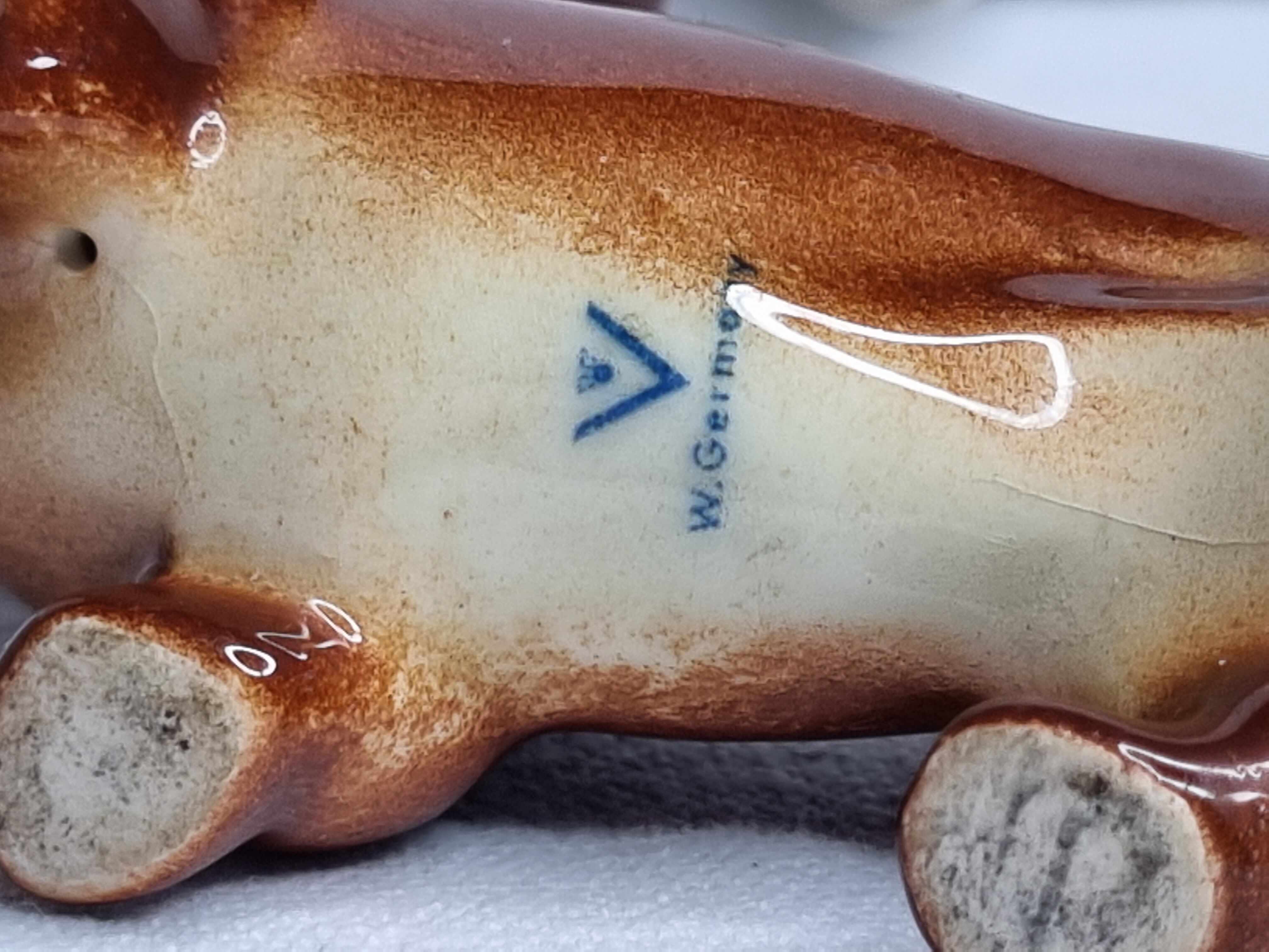 Set of three porcelain puppies