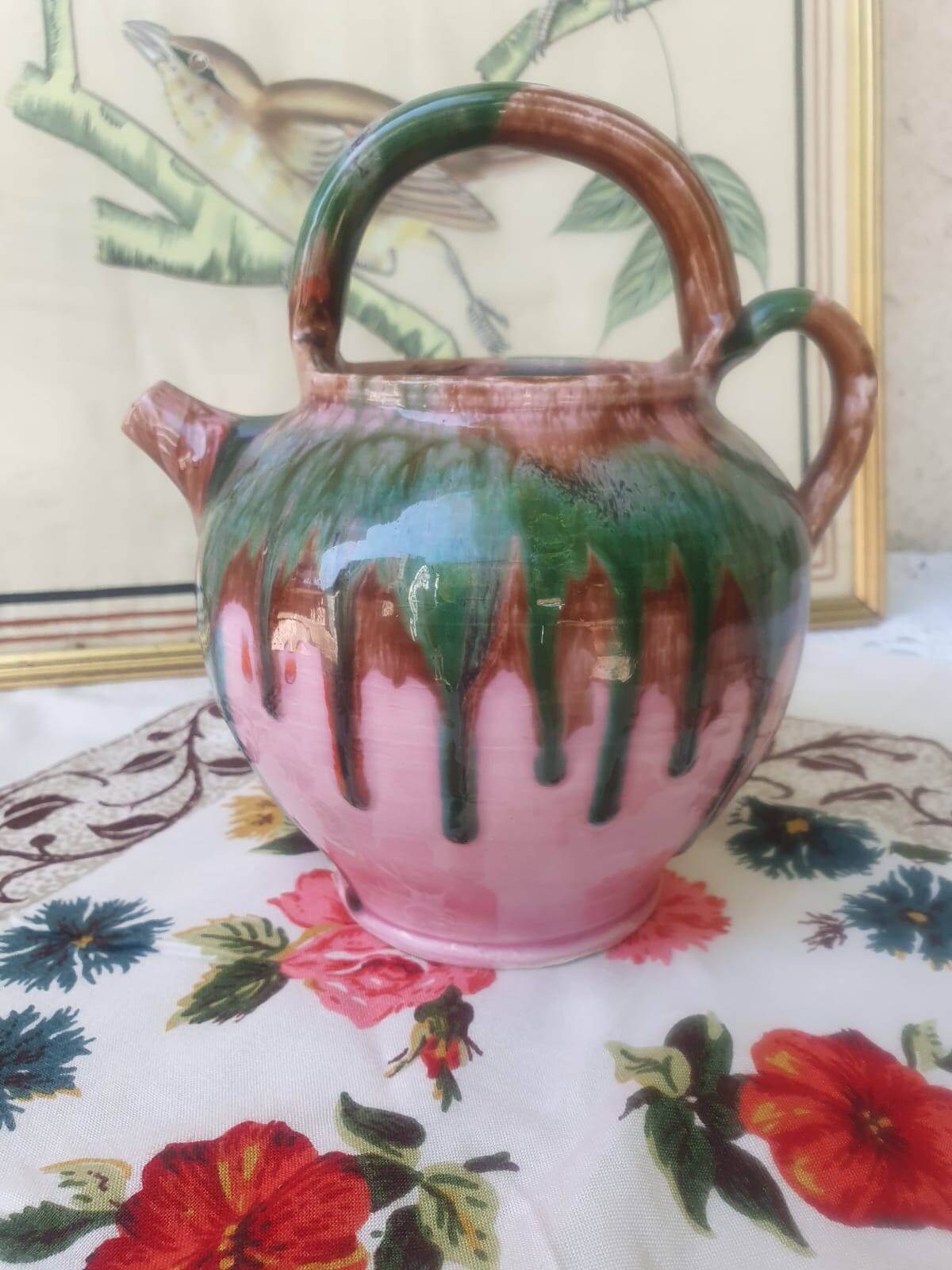 Jug pitcher Provençal earthenware glazed with pink and green glaze.