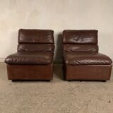 A pair of leather armchairs, Switzerland, 1970s