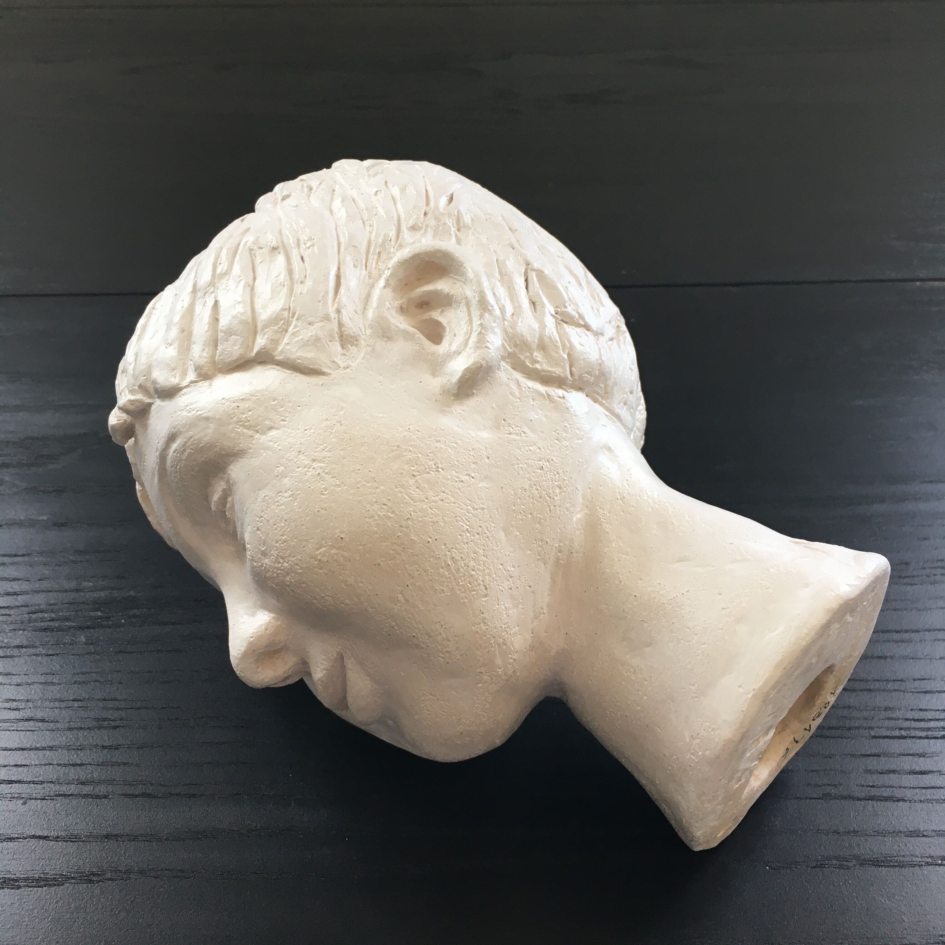 Plaster girl's head