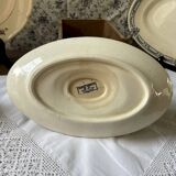 Sauceboat on a wrought iron base from Salins.