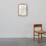 Mirror by Deknudt with marbled fume glass side panels in gilded wooden fram