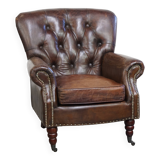 Cognac colored brown grained cowhide chesterfield armchair