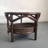 Vintage rattan coffee table with smoked glass top and rattan basket shelf