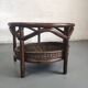 Vintage rattan coffee table with smoked glass top and rattan basket shelf