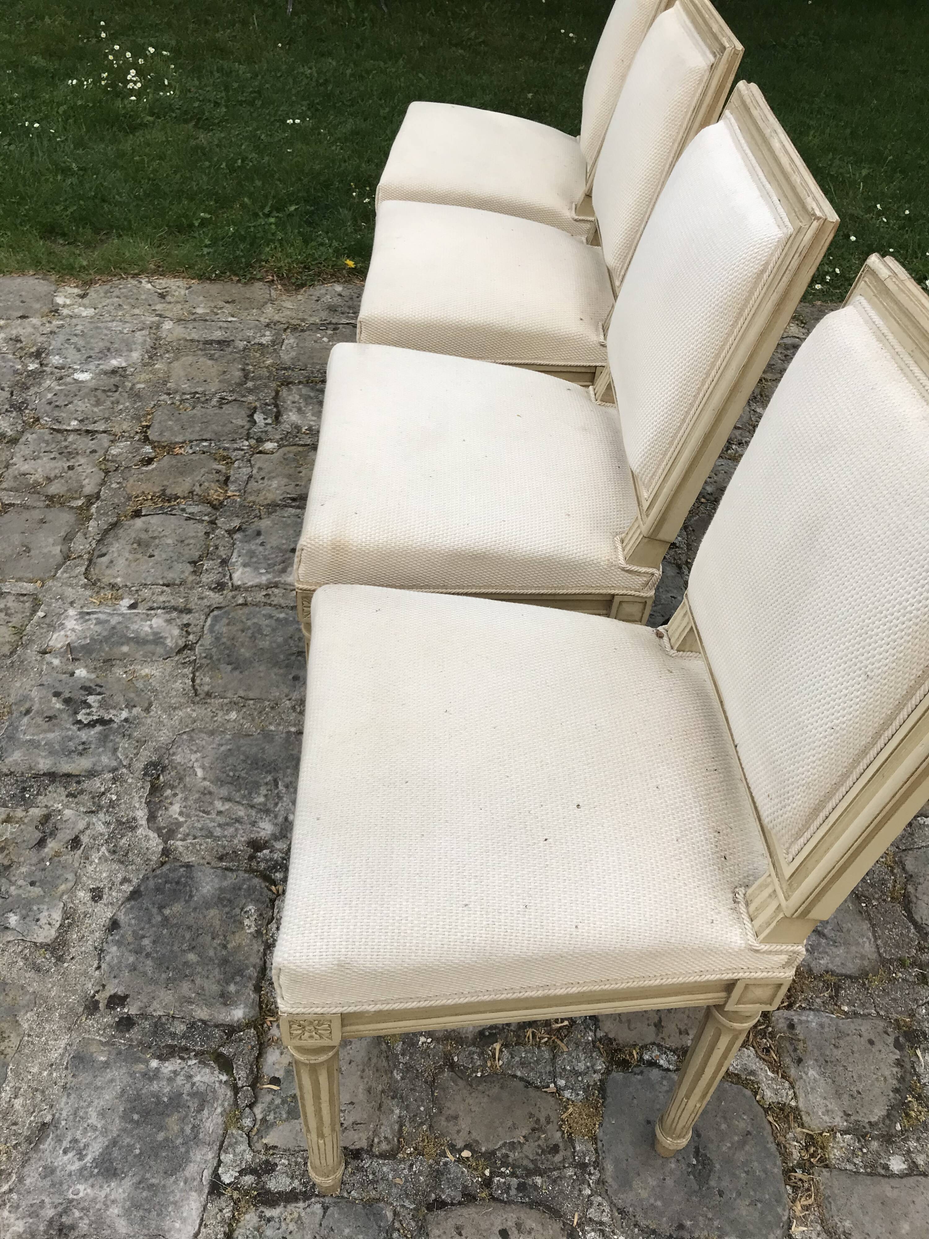Series of 4 chairs of upholsterer style Louis XVI