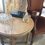 Round wooden side table