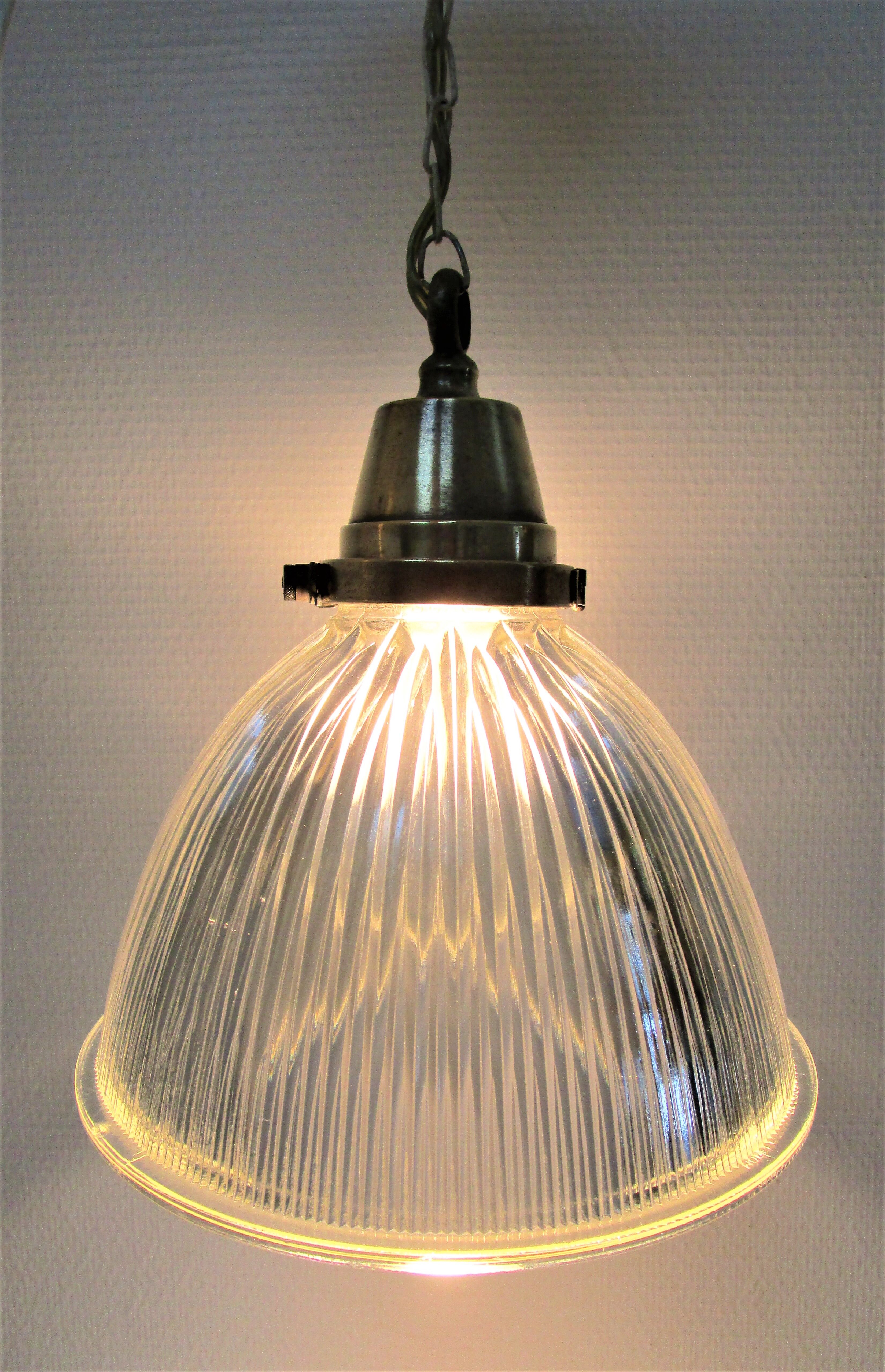 Holophane glass suspension and vintage patinated brass
