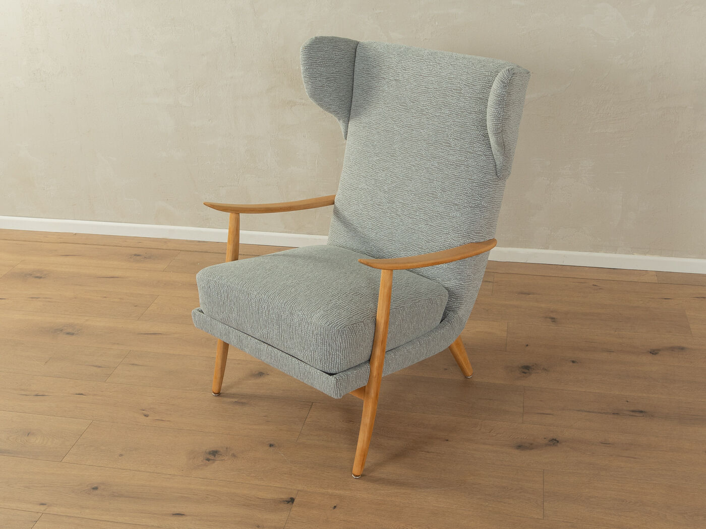 Classic wingback armchair from the 1950s