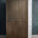 Antique Parisian wardrobe in white wood with shelves from the 1950s.