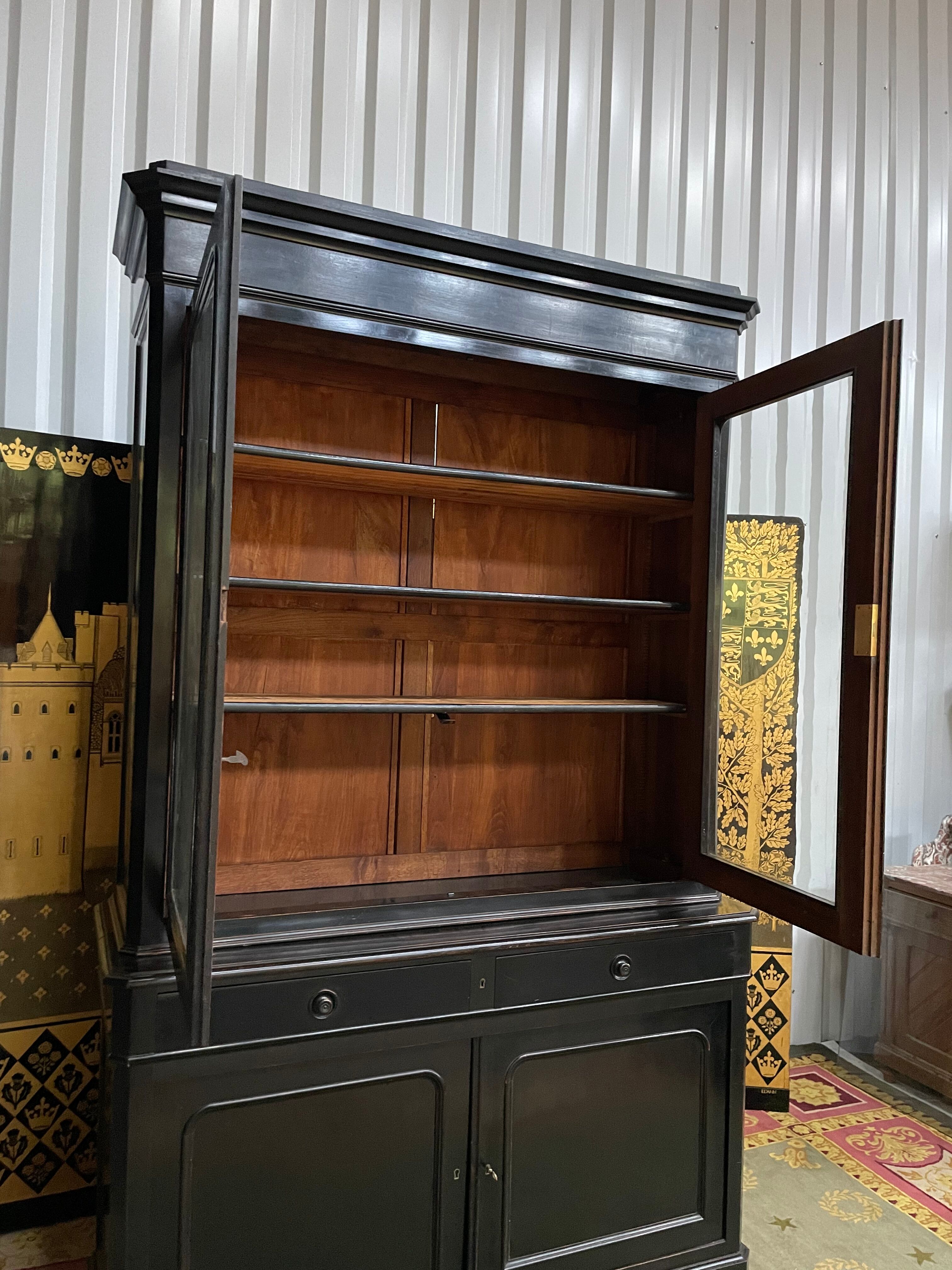 Louis Philippe two-body sideboard in blackened wood 19th