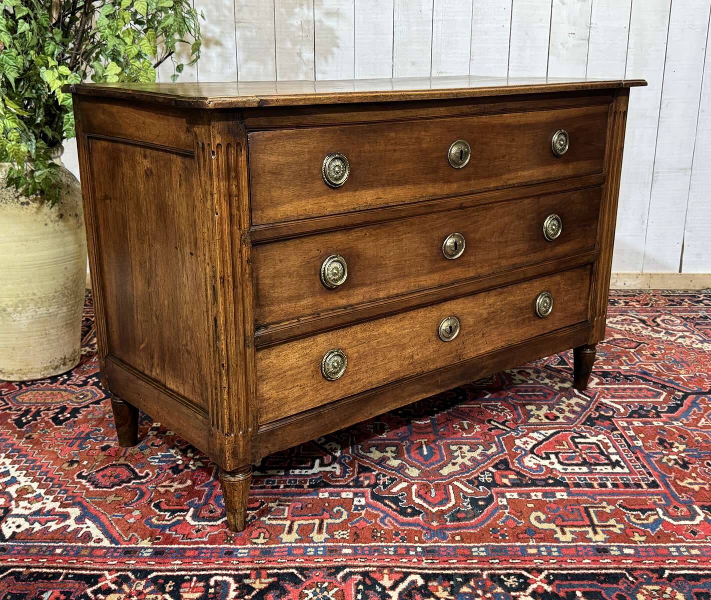 Louis XVI commode from the 18th century in walnut.