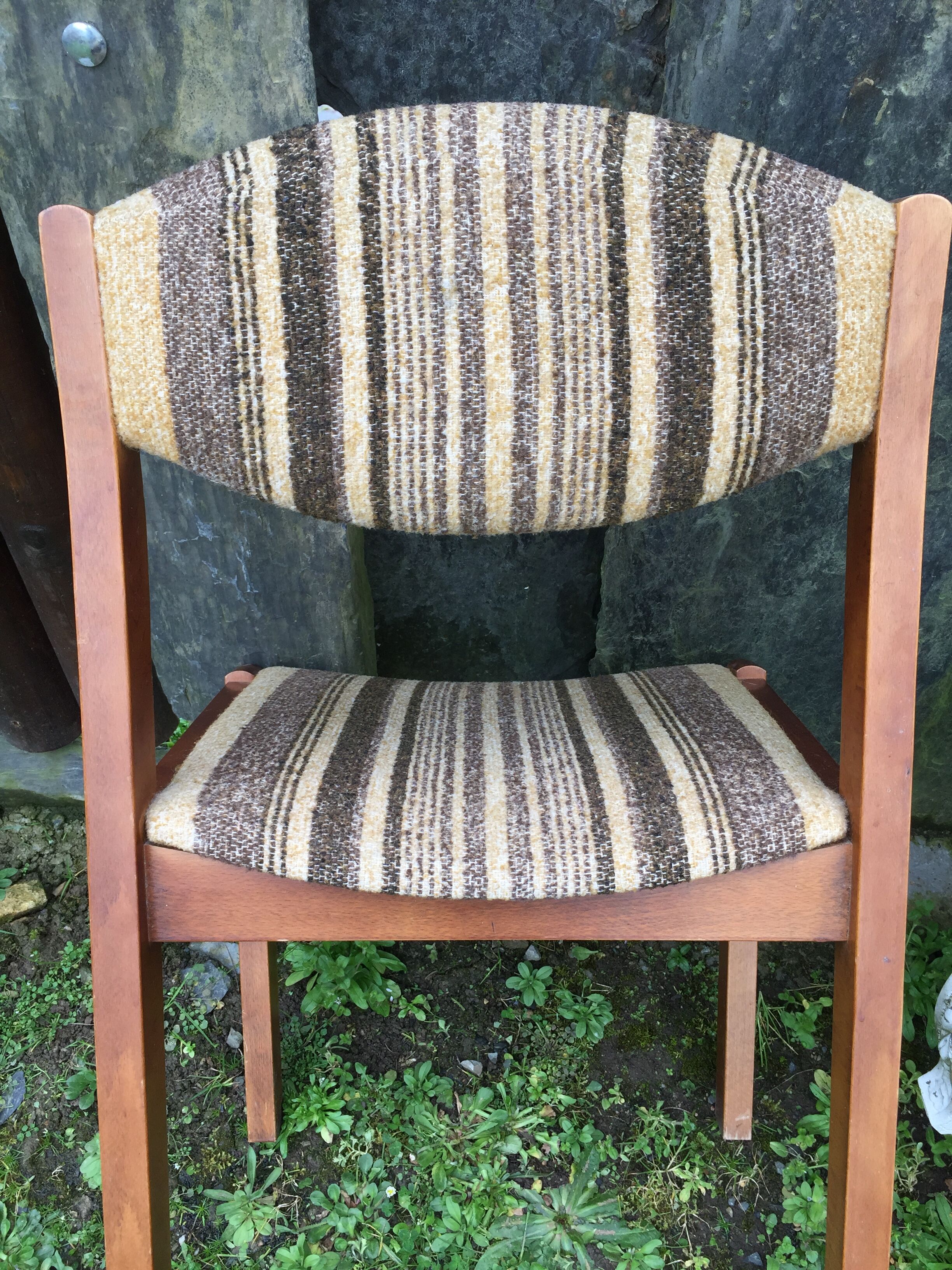 Vintage Scandinavian chairs in fabric and wooden footing.