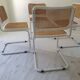 B32 chairs by Marcel Breuer in white.