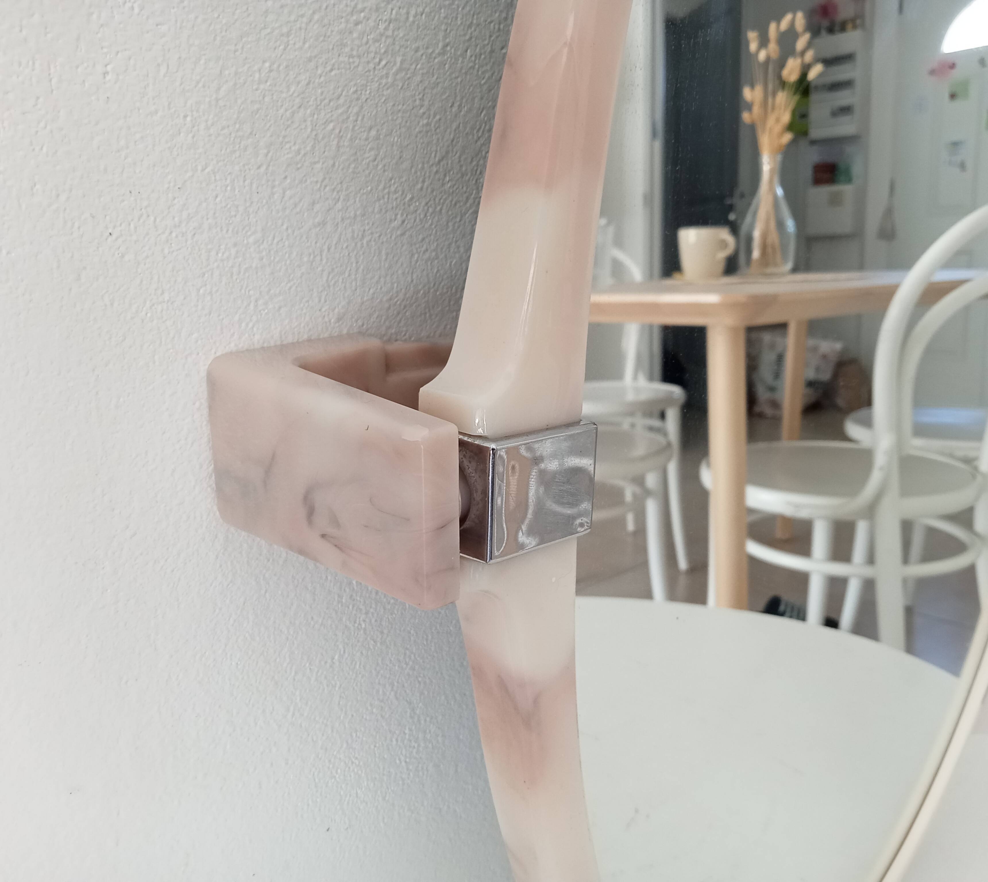 Vintage mirror with a marbled effect from the 70s.