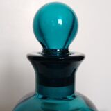 Flacon en verre et son bouchon bleu turquoise