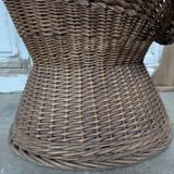 Large woven rattan armchair