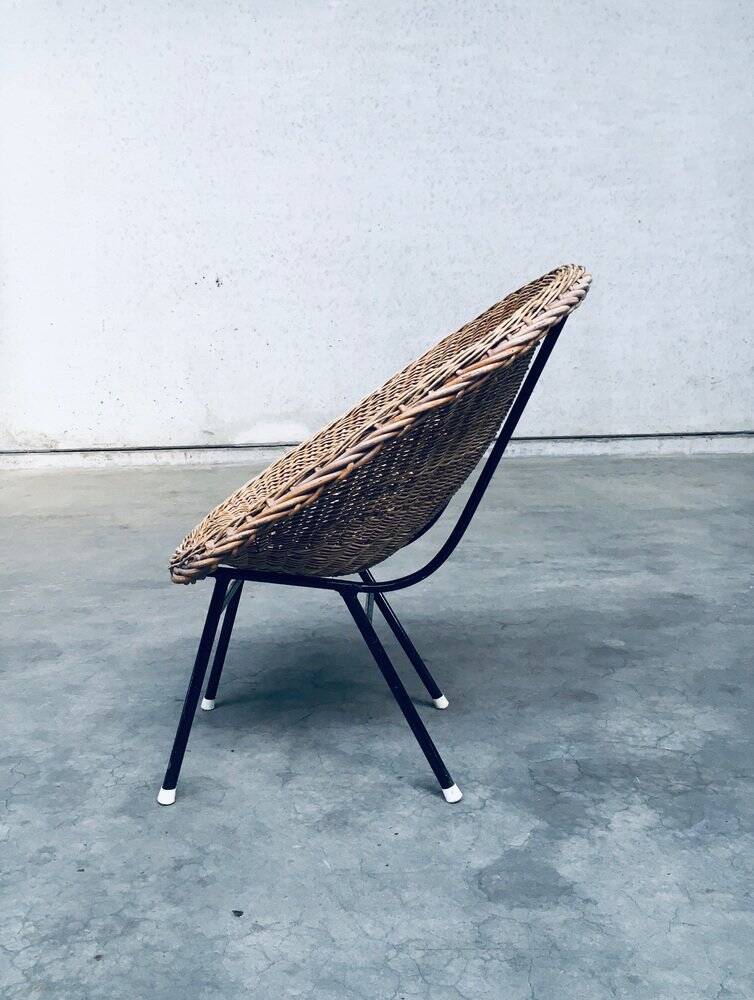 Wicker lounge chair in the style of Dirk Van Sliedregt for Rohé Noordwolde, Netherlands, 1960s.