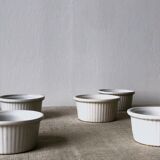 Pleated ramekins for white enamelled crème brûlée.