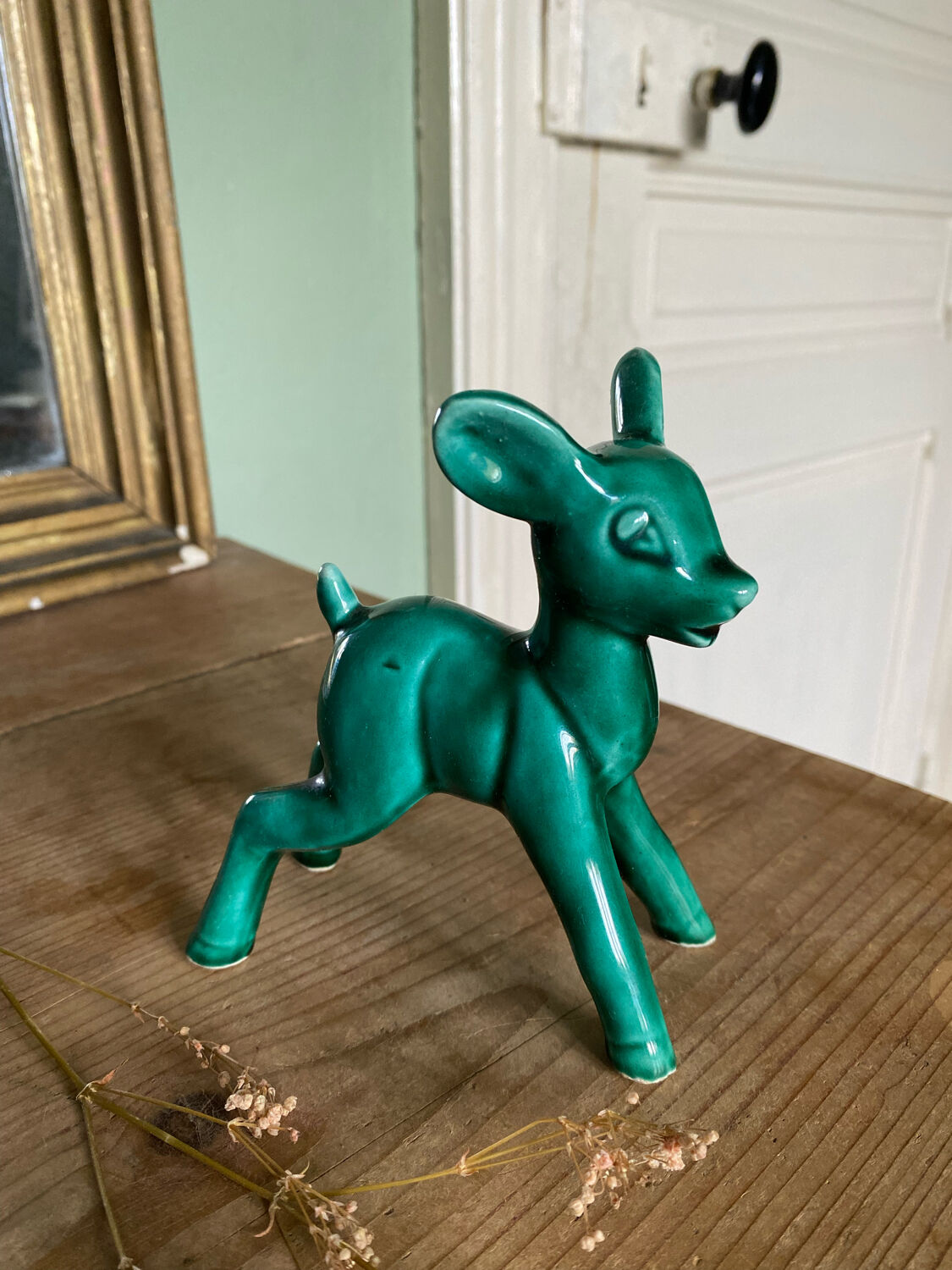 Art Nouveau green glazed ceramic fawn