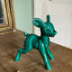 Art Nouveau green glazed ceramic fawn