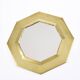 Old golden octagonal mirror, in brass