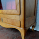 Louis XV style showcase in cherry wood and veneer nineteenth century