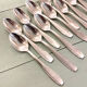 Series of 14 Art Deco dessert spoons, silver metal