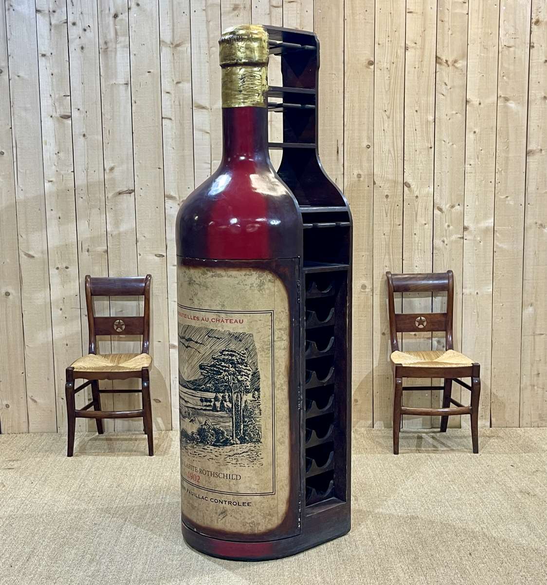Advertising bar furniture in the shape of a giant wine bottle 90s