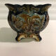 Slip hides old pot