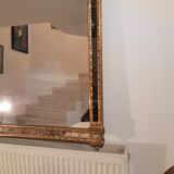 Mirror with parecloses