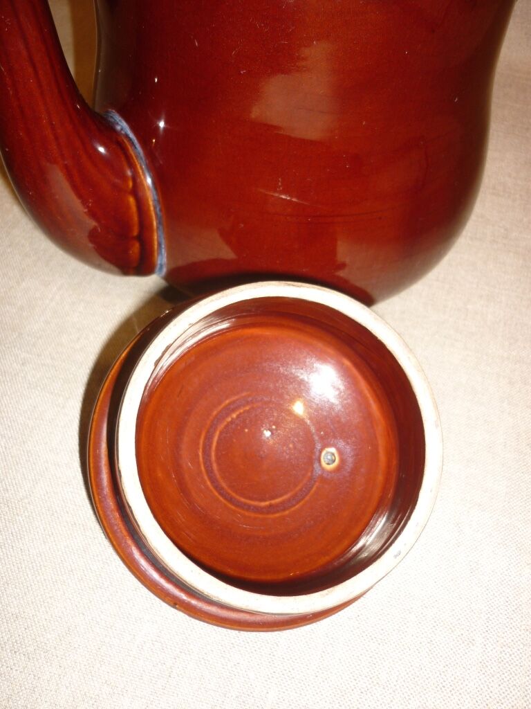 Very large brown ceramic coffee maker