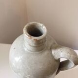 Antique grey stoneware bottle with vintage handle