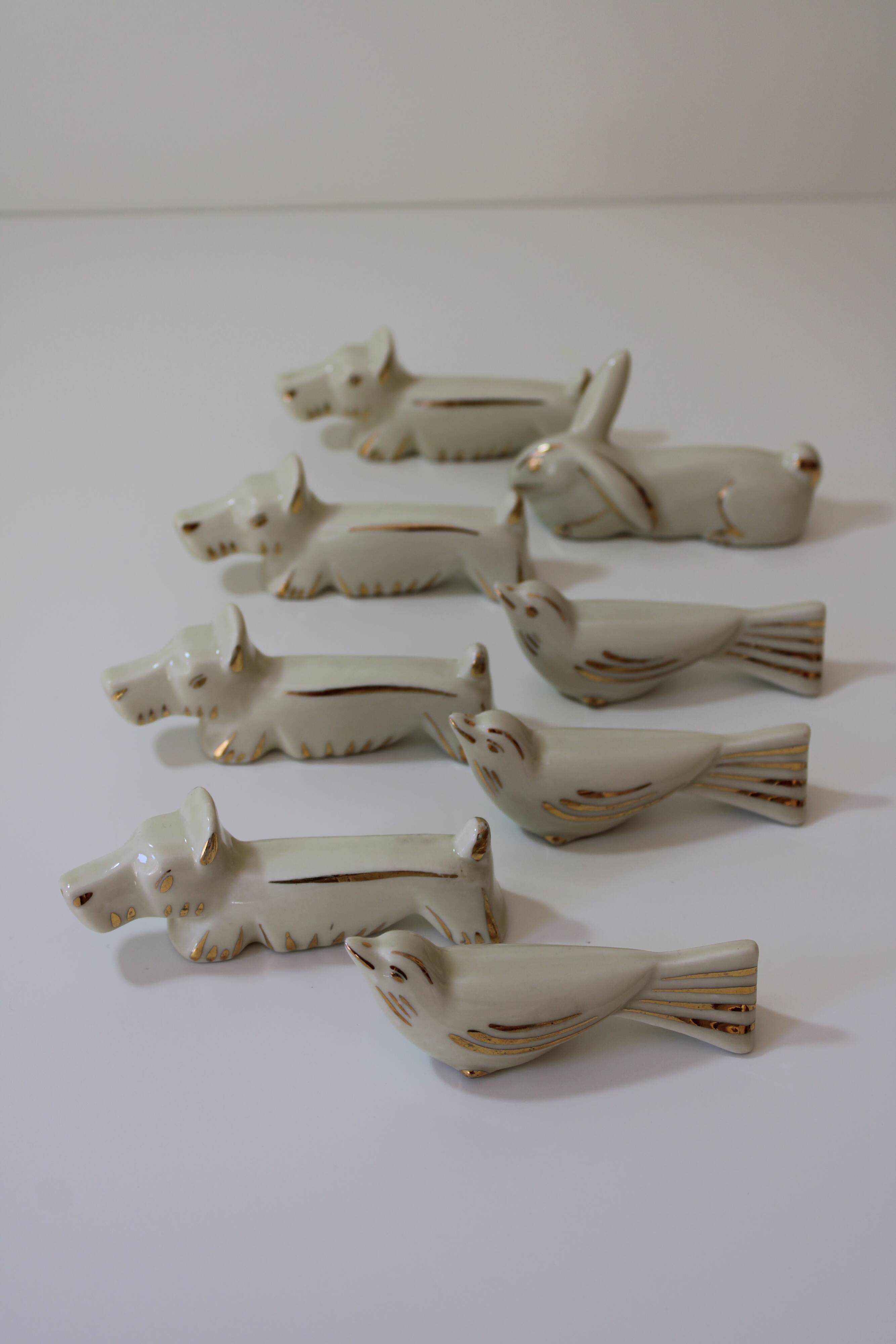 8 portes couteaux animaux porcelaine de Limoges vintage
