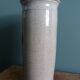 Signed scroll vase with poppy dragonfly decor