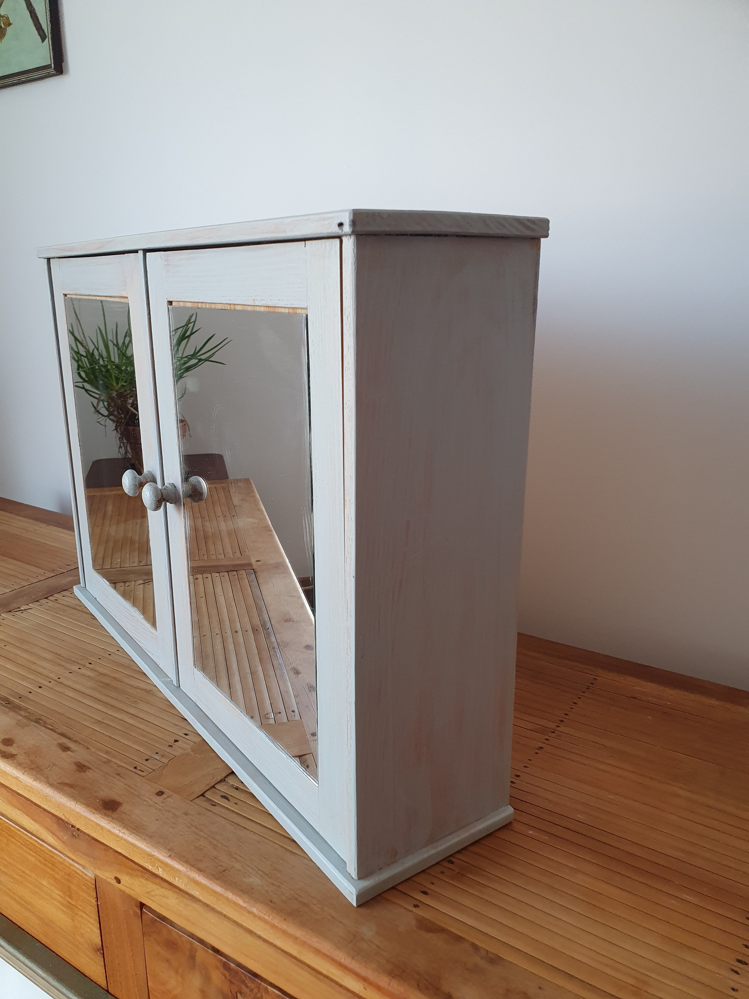 Greyed wood medicine cabinet