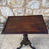 Tripod pedestal table in solid oak, richly carved and molded, 19th century