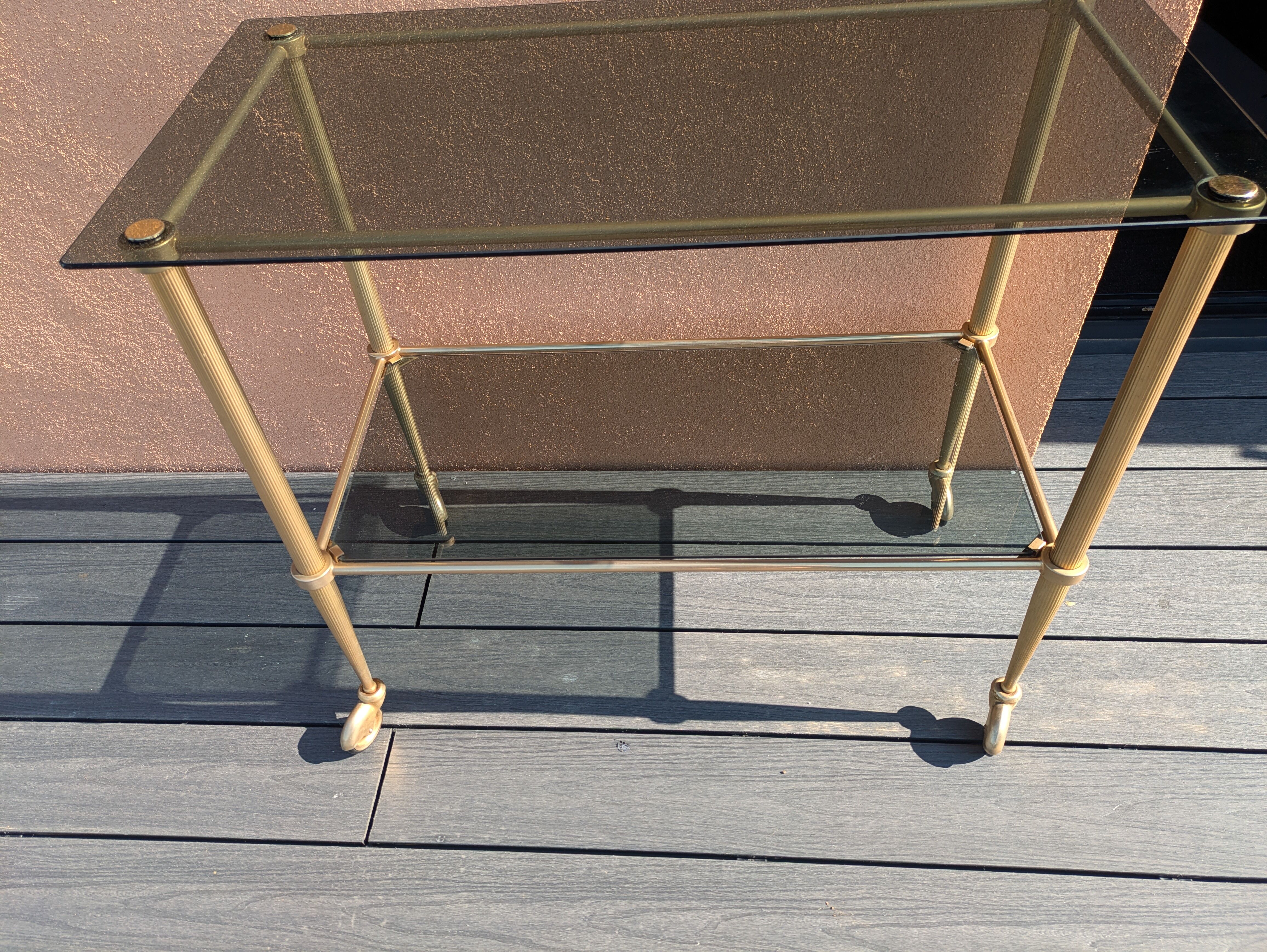 Smoked glass and brass dessert table
