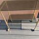 Smoked glass and brass dessert table