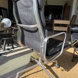 Eames soft pad chair in black leather, Herman Miller edition.