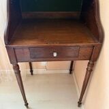 Pretty little secretary with a curtain.