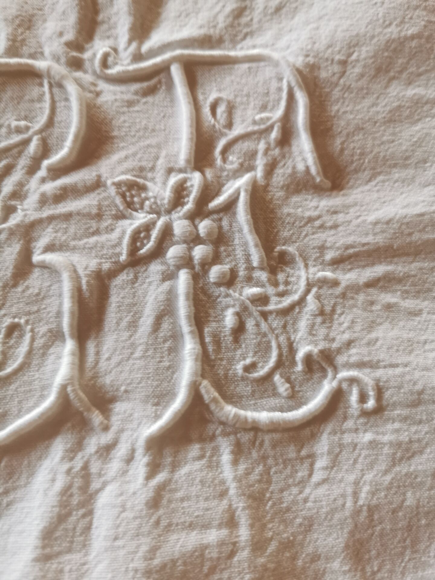 Antique monogrammed fabric