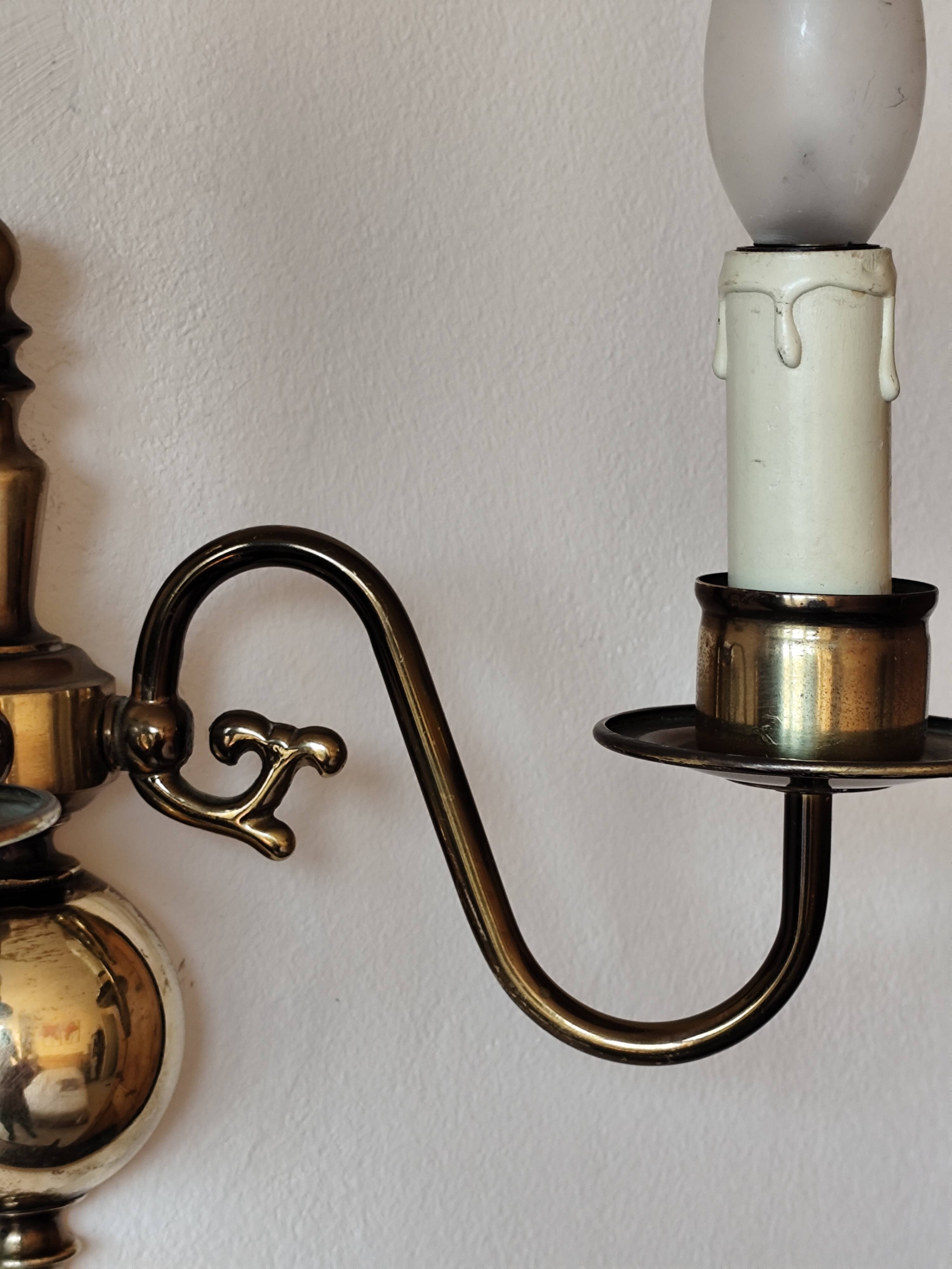Pair of Dutch style 2-light brass wall lights