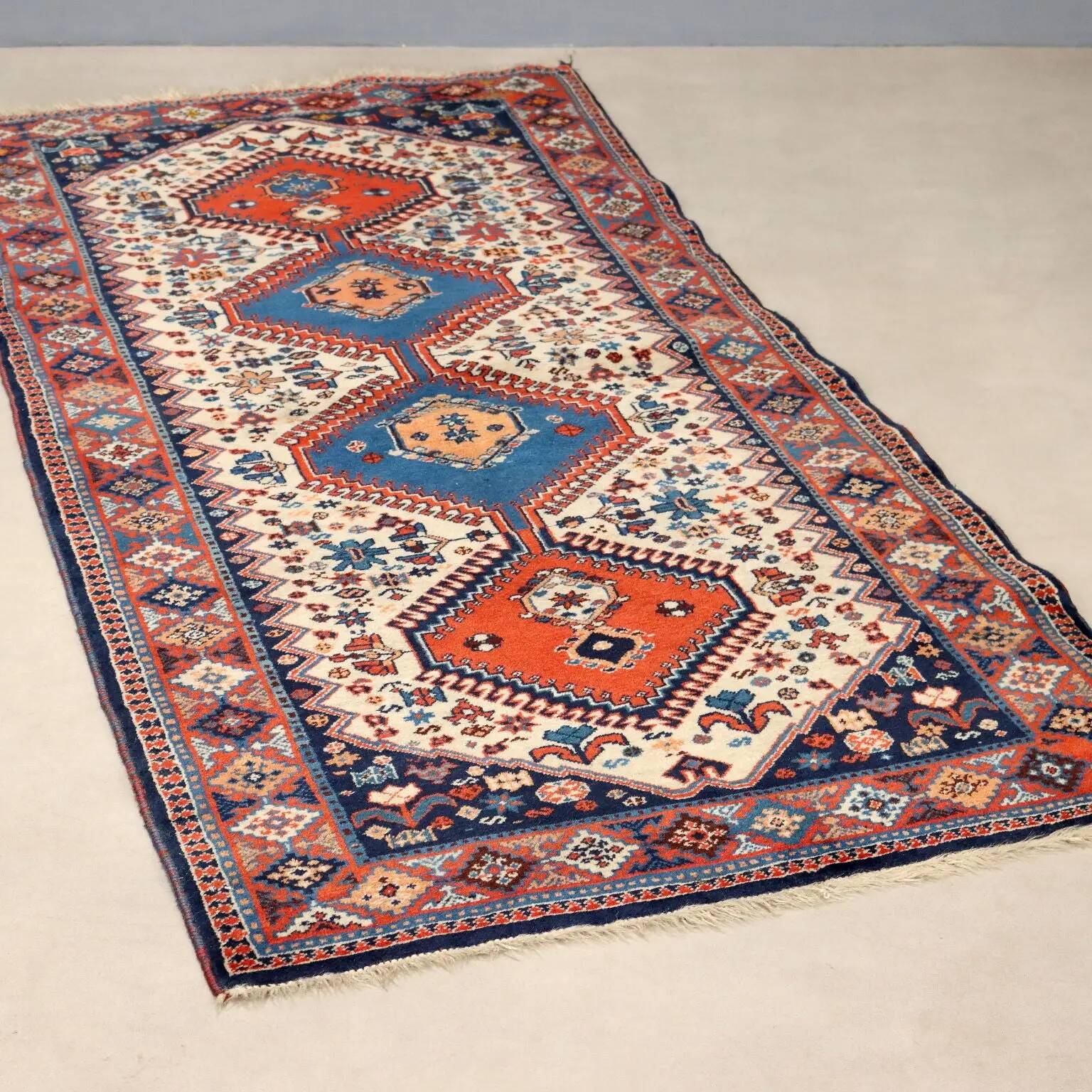 Ancient Asian wool rug, finely knotted, handmade 72 x 33 in.