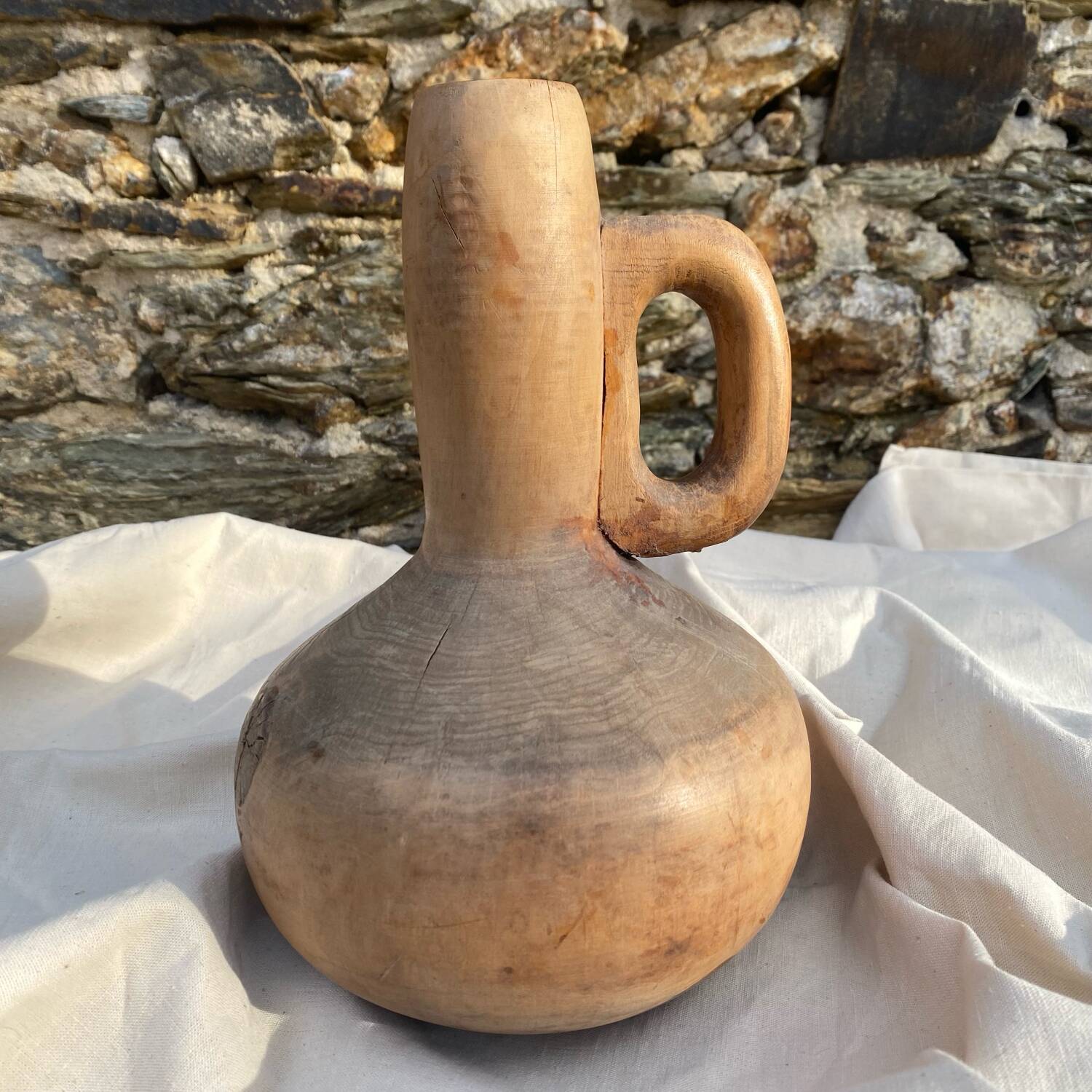 Wooden vase, brutalist, wabi-sabi, vintage craftsmanship.