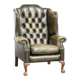 Vintage cowhide leather Chesterfield wingback armchair in a green colour