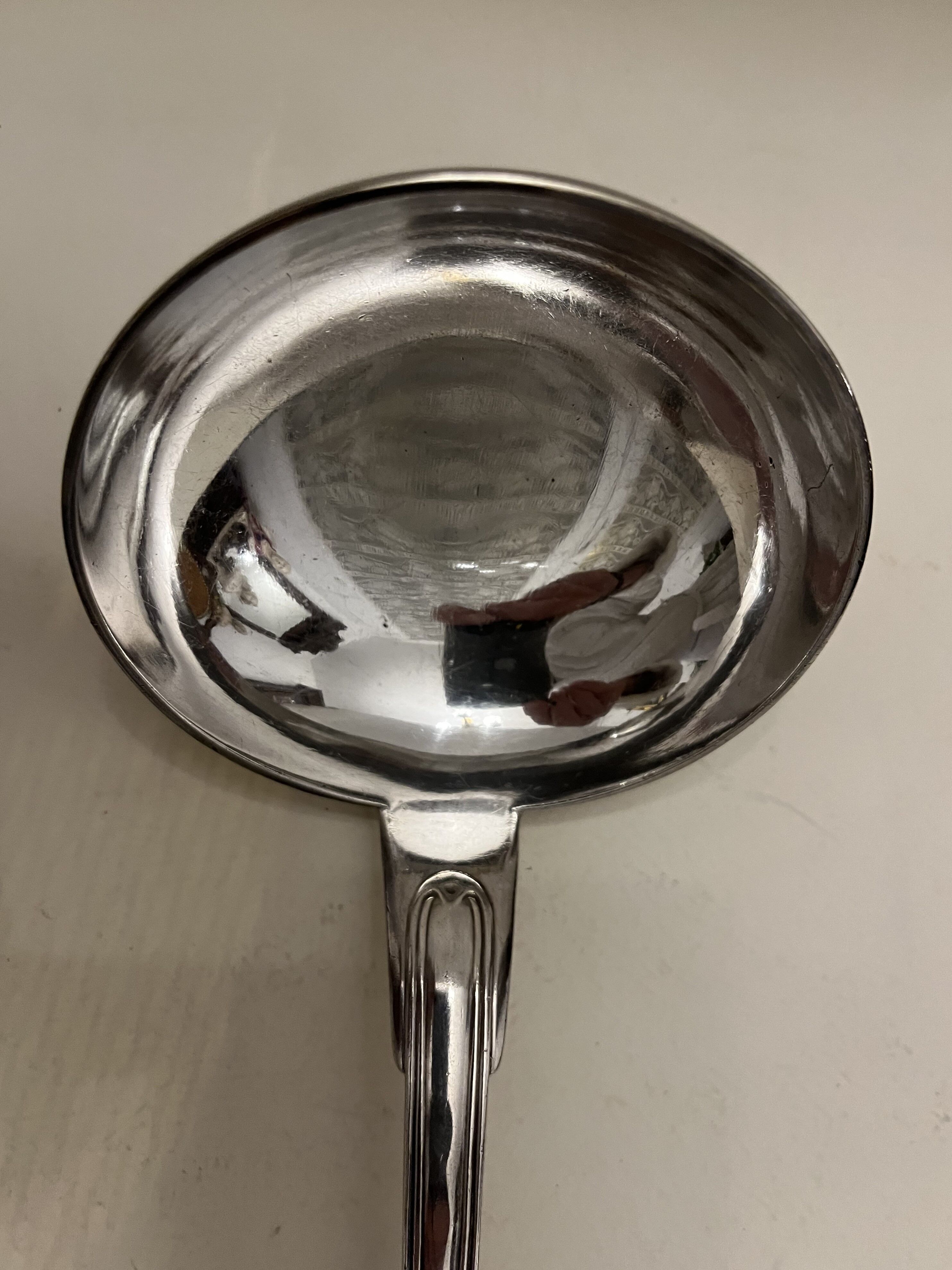 Silver metal ladle